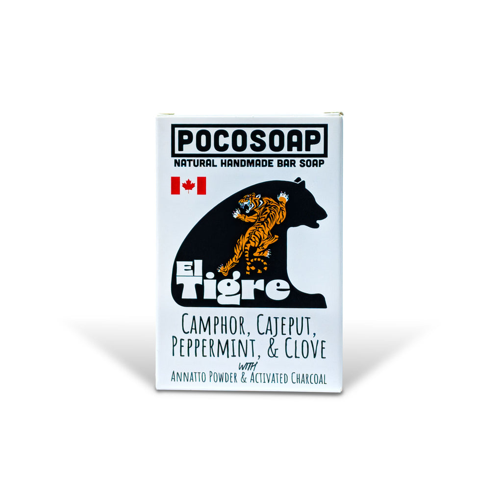 El Tigre muscle recovery soap by PoCo Soap Co. in its black and white packaging with a tiger on it. A 100% natural bar featuring cooling Menthol crystals, Camphor, Cajeput, and Clove essential oils.