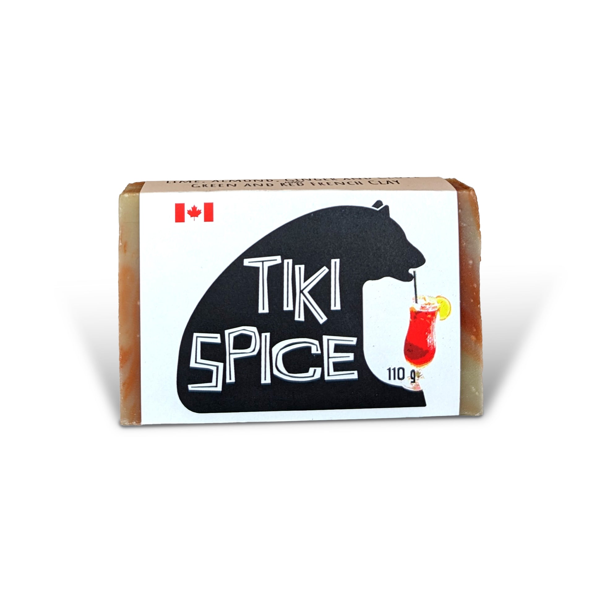 Tiki Spice natural soap bar by PoCo Soap Co. in its black and white label. A handcrafted bar featuring red and green French clay swirls with Lime, Almond, Clove and Ginger essential oils.